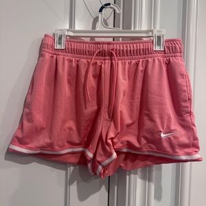 Pink Nike short basketball shorts